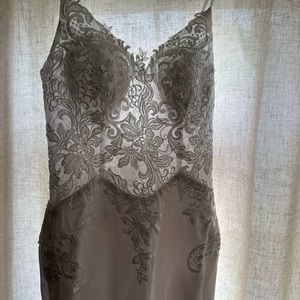 Wedding dress never worn, brand new with tags size 2.